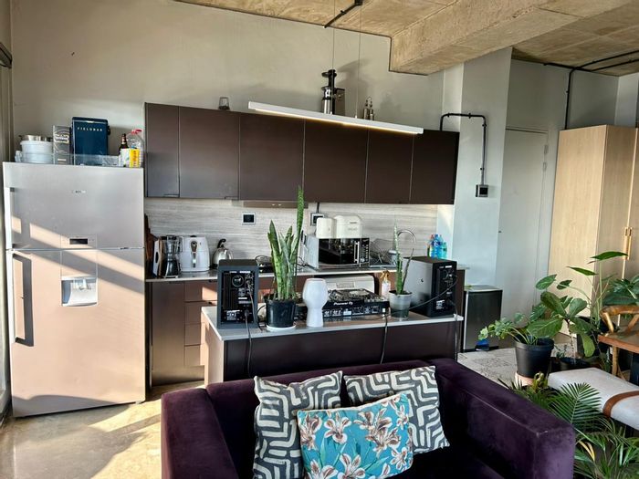 For Sale: 2-Bedroom Apartment in Doornfontein with Rooftop Bar and Restaurant.