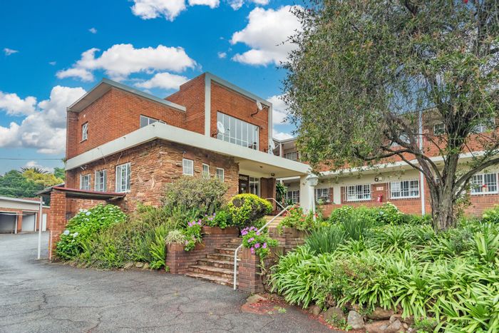 For Sale: Townhouse in Sandringham with pool, garage, and versatile sunroom.