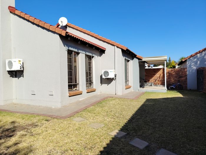 For Sale: Family-friendly townhouse in Monavoni with garden, pool, and secure complex.