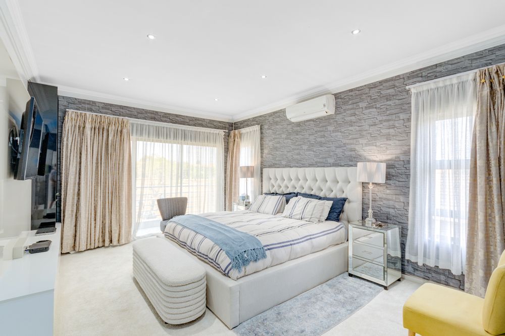 main bed & white carpet