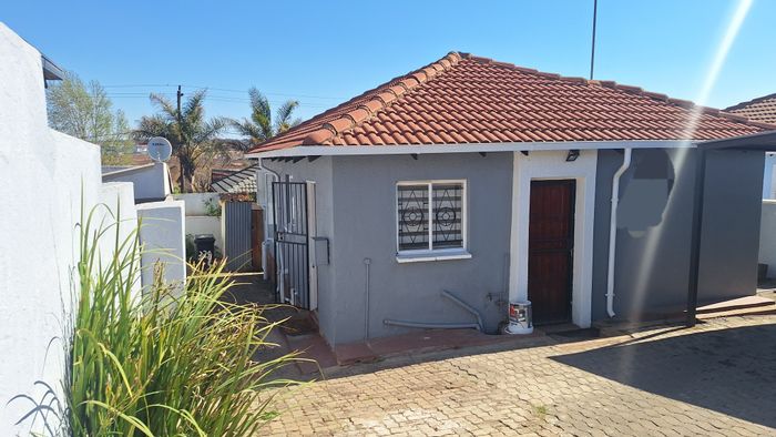 3-Bedroom House For Sale in Clayville East with secure carport and expansion potential.