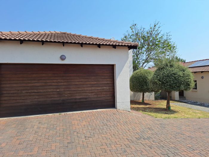 3-Bedroom Townhouse For Sale in Thatchfield Estate with private garden and braai.