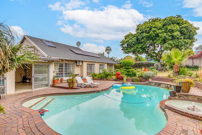 For Sale: Spacious Kelvin House with Pool, Cottage, Solar Power, and Security Features.