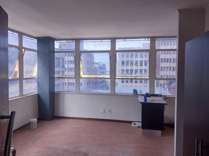 Bachelor Apartment For Sale in Johannesburg Central with security and convenient access.