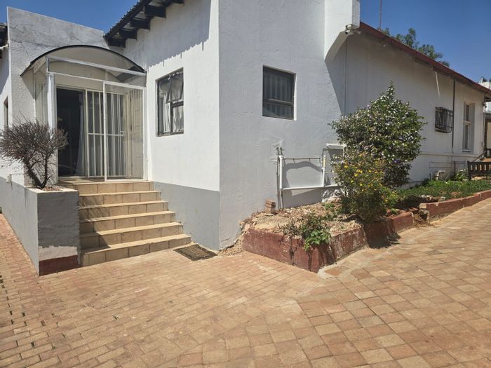 For Sale: House in Observatory with 11 rental units and expansion potential.