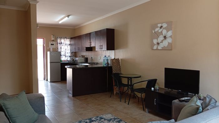 2 Bedroom Townhouse For Sale in Standerton Central with parking and low-maintenance yard.