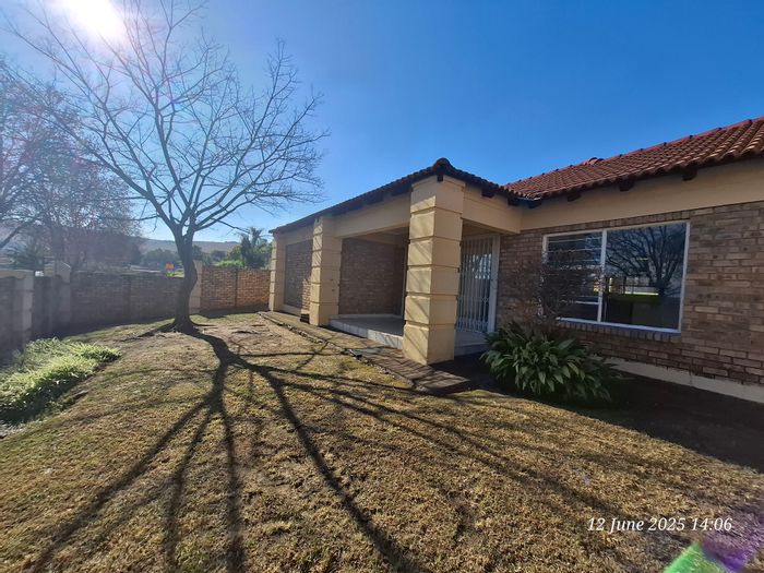 For Sale: Townhouse in Signal Hill with 2 beds, secure access, garage, and carport.