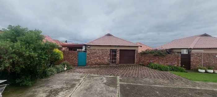 For Sale: Townhouse in Pioneer Park with sunroom, garage, and secure complex access.