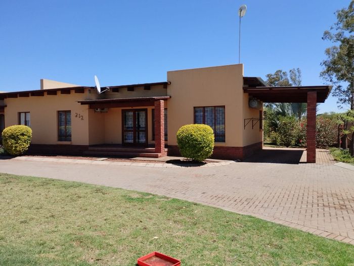 Townhouse for Sale in Bela Bela Central: 2 beds, open plan living, secure complex.