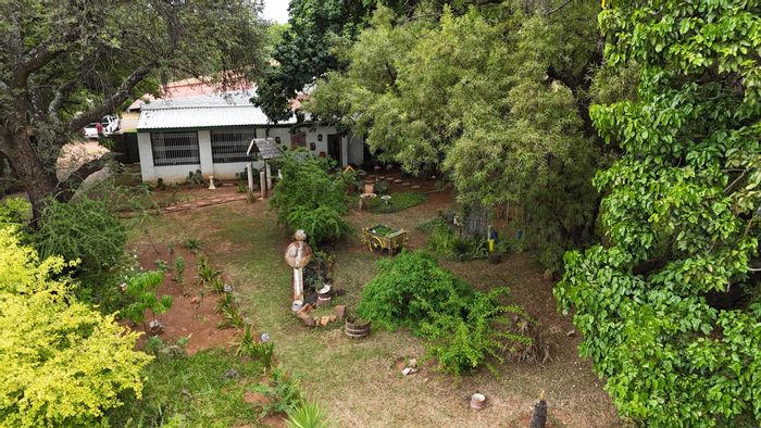For Sale: Bela Bela Central Small Holding with flats, dam, workshop, and water rights.