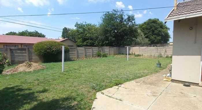 Mackenzie Park House For Sale: 3 Bedrooms, spacious yard, garage, and potential.