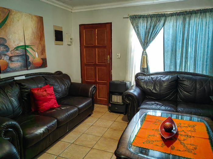 For Sale: 3-Bedroom House in Grasslands with spacious living, fenced yard, and carport.