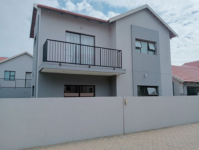 For Sale: Olive Hill Townhouse with 3 bedrooms, private garden, and braai room.