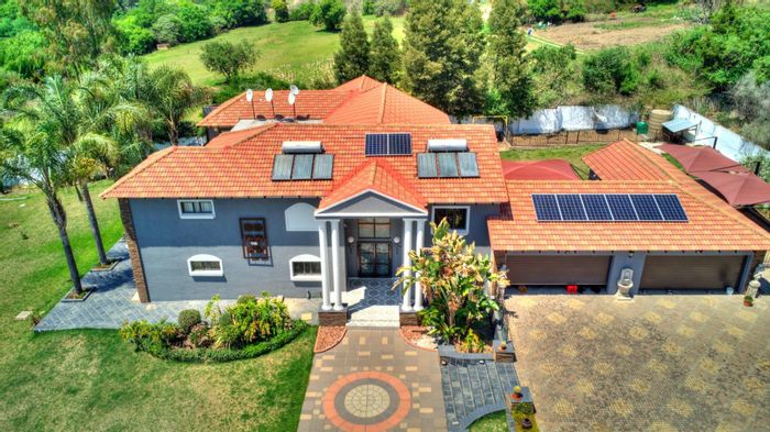 Spacious North Riding AH house with multiple dwellings, pool, and extensive amenities. For Sale.