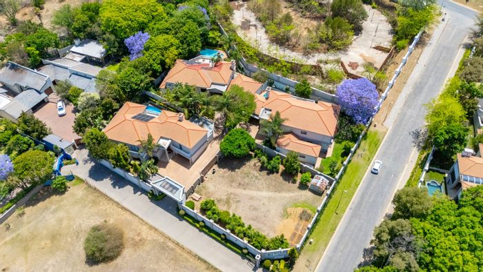 For Sale: Bryanston House Complex with 3 Units, Vacant Land, and Amenities.