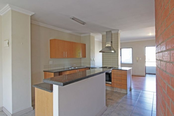 Rivonia Apartment For Sale: 2 Beds, 2 Baths, top-floor views, and parking.