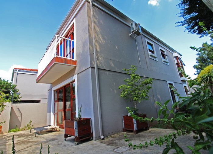 For Sale: 2 Bedroom Townhouse in Bryanston with garden, double garage, and pool.