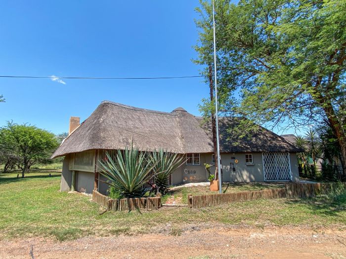 House for Sale in Mookgopong Central: 3 Bedrooms, double braai area, resort amenities.