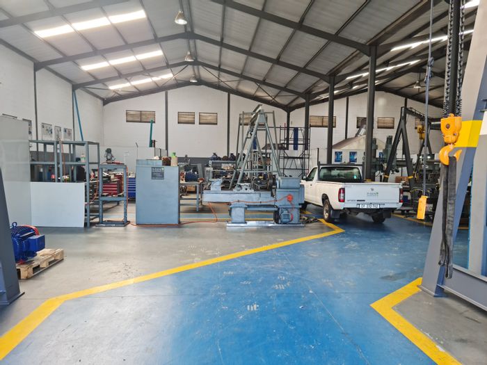 1166m² Industrial Warehouse To Rent in Saxenburg Park 2 with secure parking.
