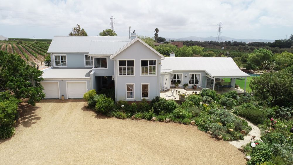 Easter side of house - garages and parking area