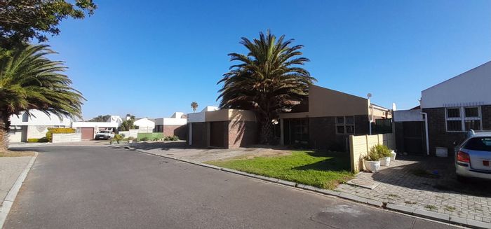 Charming 2-bedroom house in Sea Breeze with garden, garage, and patio. For Sale.