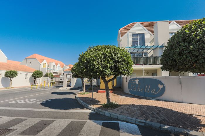 For Sale: Apartment in Whispering Pines with private garden, pool, and security access.