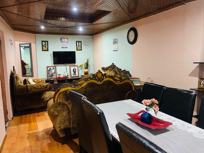 4-Bedroom House For Sale in Harare with Double Garage and Spacious Living Areas.