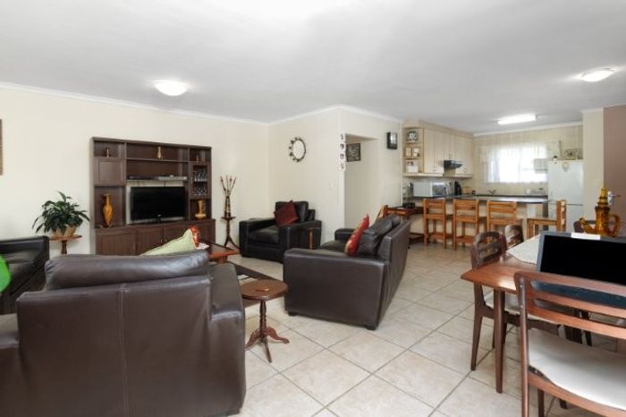 House For Sale in Fairview Golf Estate: 3 beds, private garden, double garage.