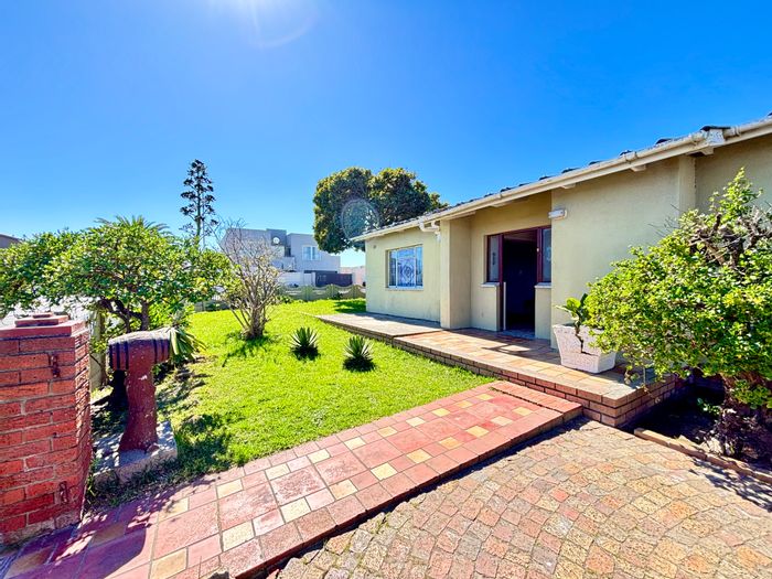For Sale: Spacious 4-bedroom house in Lotus River with expansive garden and dual kitchens.