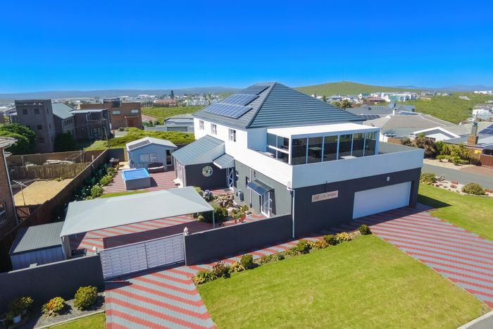 For Sale: House in Yzerfontein Central with ocean views, solar power, and versatile spaces.