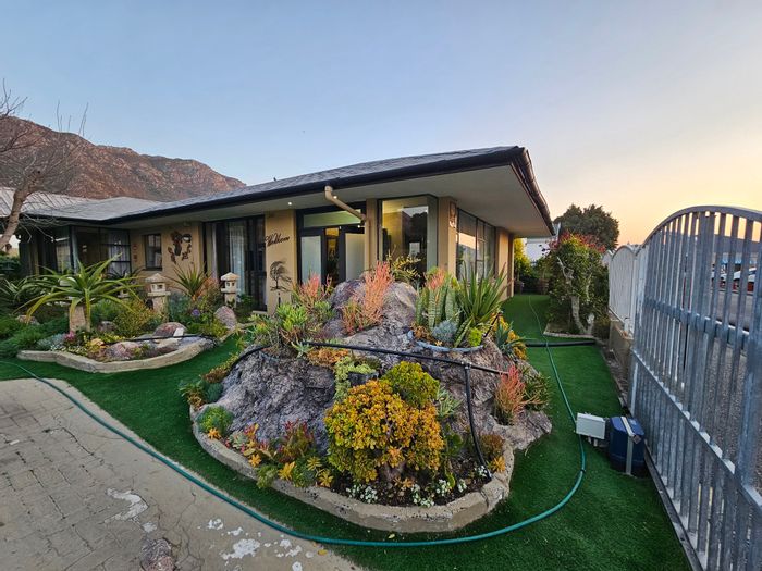 Charming Gordon’s Bay Village House for Sale: Solar-Powered, Near Beach, Shops, and Restaurants