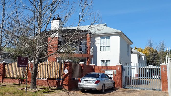 Townhouse for Sale in Stellenbosch Central: Secure complex, garage, enclosed balcony, close to amenities.