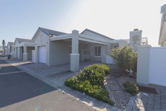 House for Sale in Yzerfontein Central: Secure estate, pet-friendly, open-plan living.