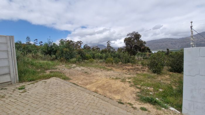 Vacant Land Residential For Sale in Villiersdorp Central with paved driveway and boundary walls.