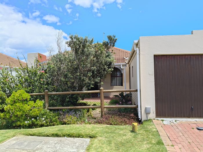 For Sale: House in Fairview Golf Estate with secure living, garage, and pet-friendly garden.