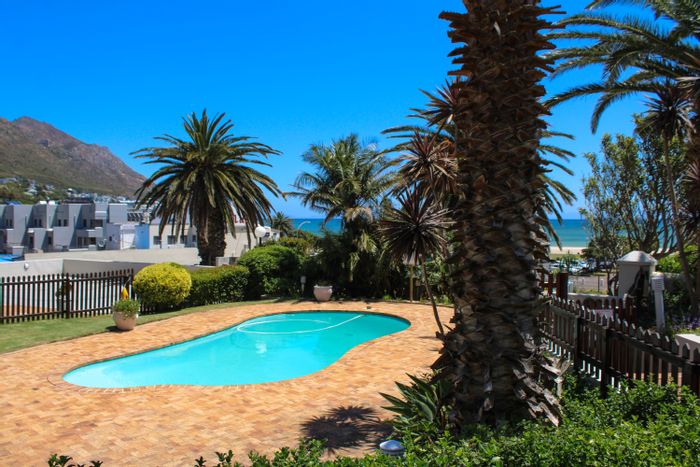 Gordons Bay Central Apartment For Sale: 2 bedrooms, sea views, private patio, pool.