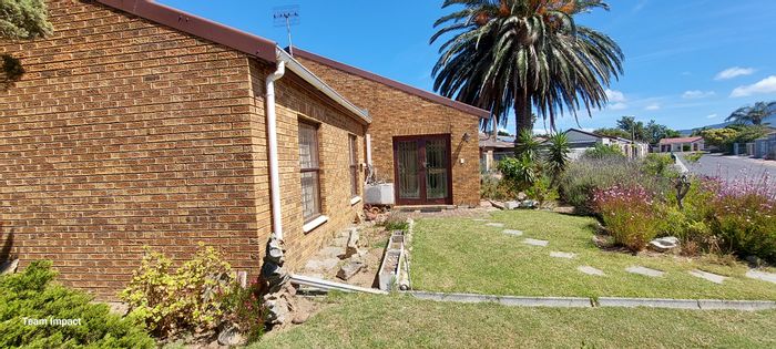 For Sale: Twin Palms Townhouse with indoor braai, garage, and renovation potential.