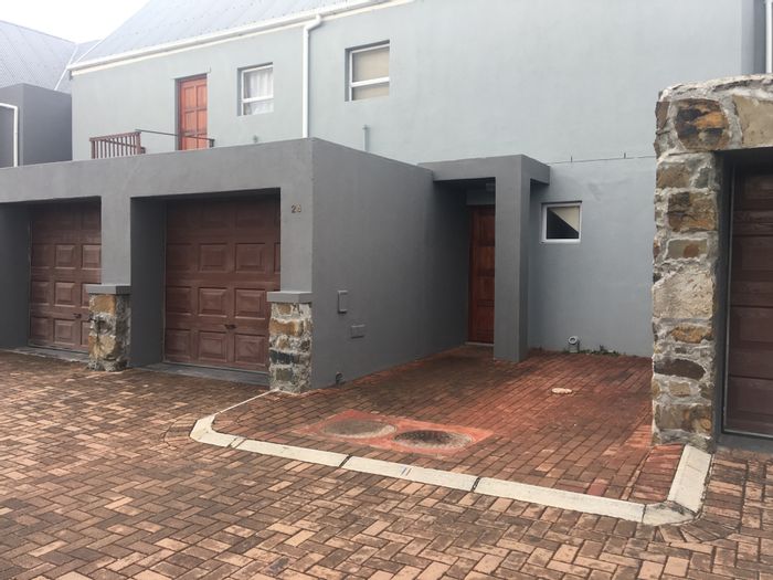 Gordons Bay Central Apartment To Rent: 2 bedrooms, private garden, garage access.