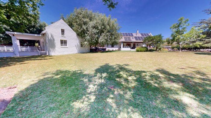 House for Sale in Stanford Central: River access, guest cottage, solar system, expansive grounds.