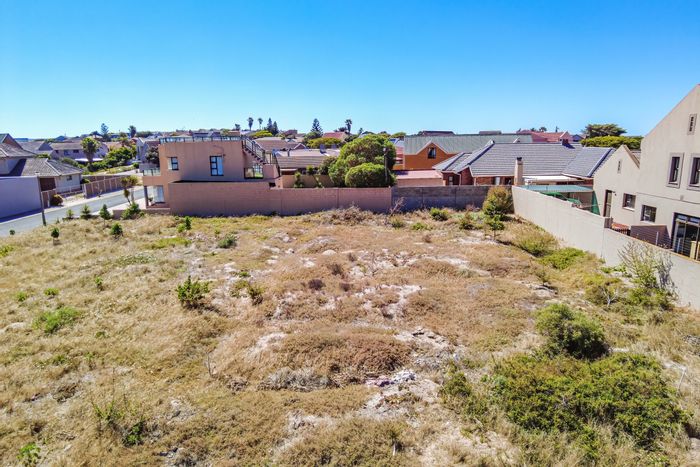 Vacant Land Residential For Sale in Bluewater Bay, steps from the beach.