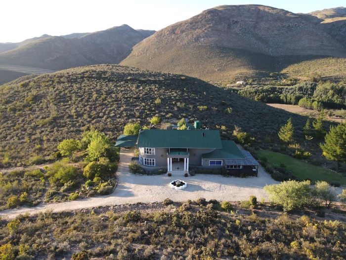 360HA Farm For Sale in Uniondale Rural with Main House and 5 Cottages.