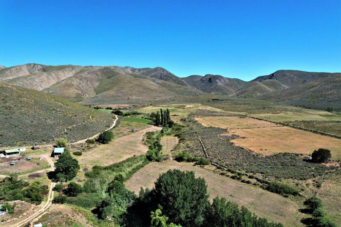 1080ha Farm for Sale in Uniondale Rural with main house, cottages, and water access.