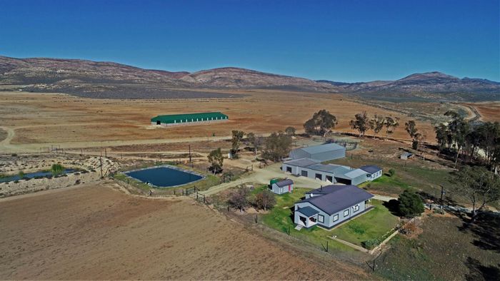 For Sale: 2070ha Farm near Uniondale with main house, cottages, and game.