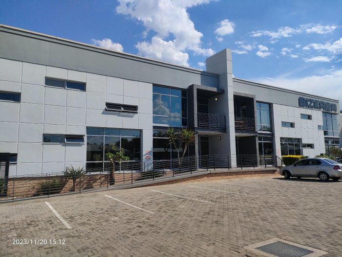 Industrial warehouse with offices, security, parking, and generator in Lanseria. To Rent.