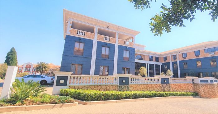 Rivonia Office To Rent: Refurbished space with backup utilities, meeting rooms, and courtyard.