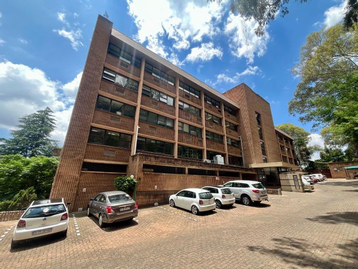 For Sale: Office in Houghton Estate with solar panels, parking for 96 vehicles.