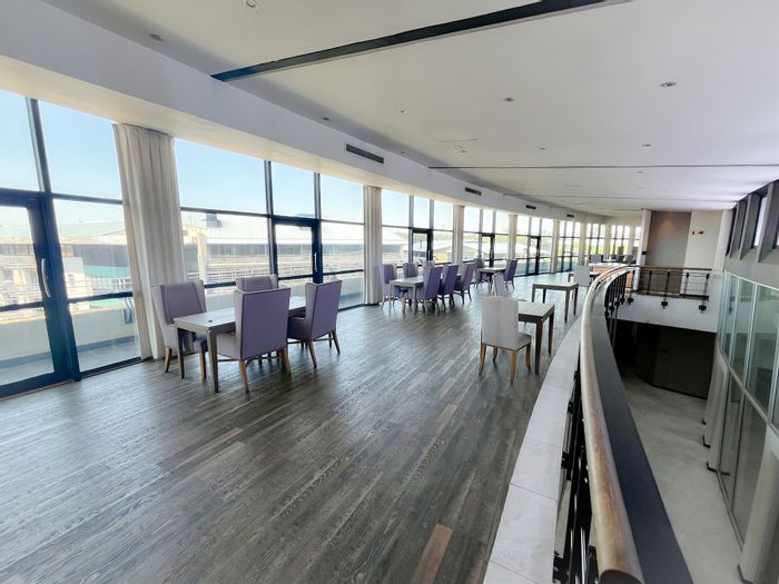 Prime office space in Melrose Arch, featuring balconies, kitchen, and internal bathrooms. To Rent.