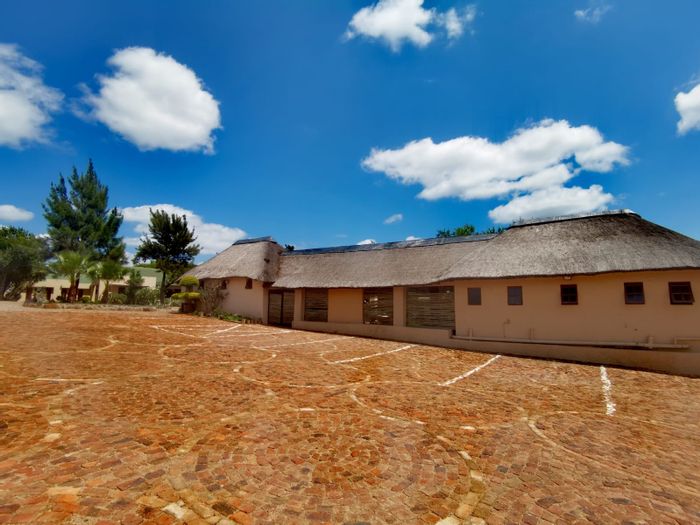 Lodge for Sale in Kraalhoek AH: 17 rooms, halls, pool, expansion potential.