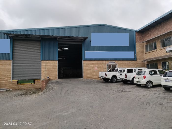 Industrial warehouse in North Riding to rent, includes security, solar power, and loading bays.
