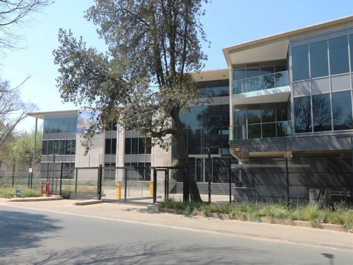 To Rent: Office in Rosebank with rooftop terrace, ample parking, and security features.